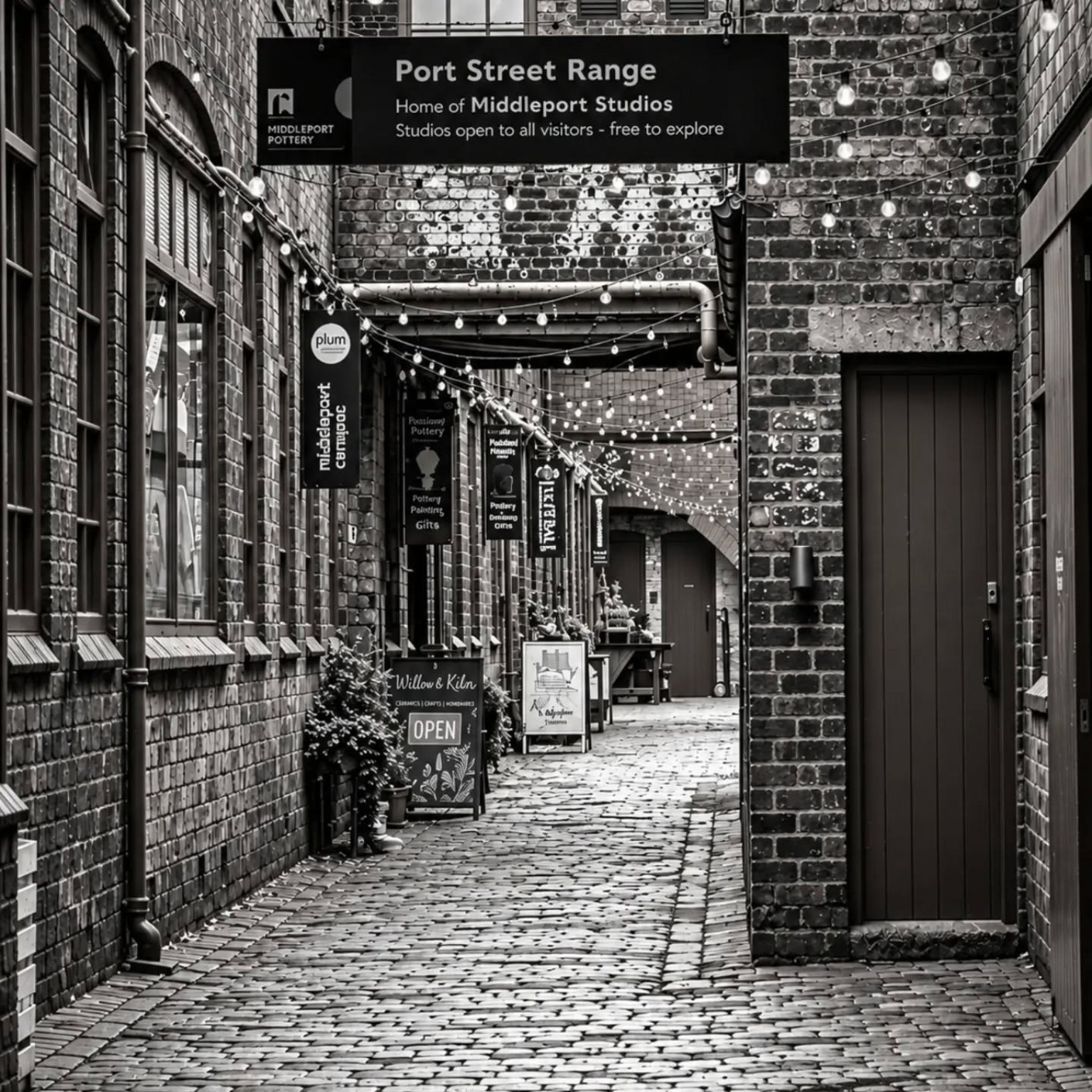 Black-and-white view along the Port Street Range at Middleport Pottery.