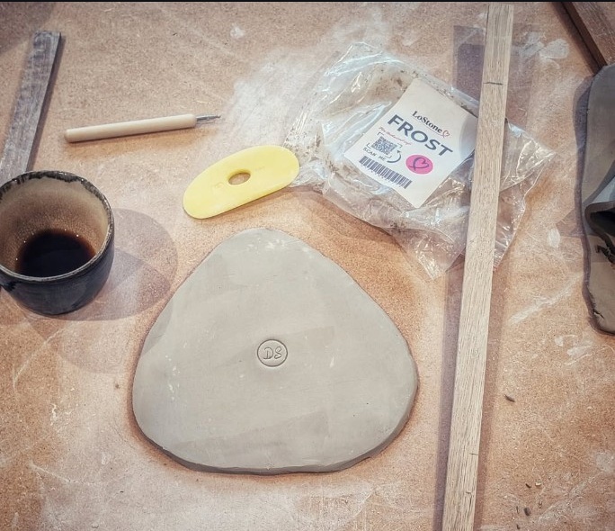 LoStone Frost clay and hand-building tools on the studio workbench