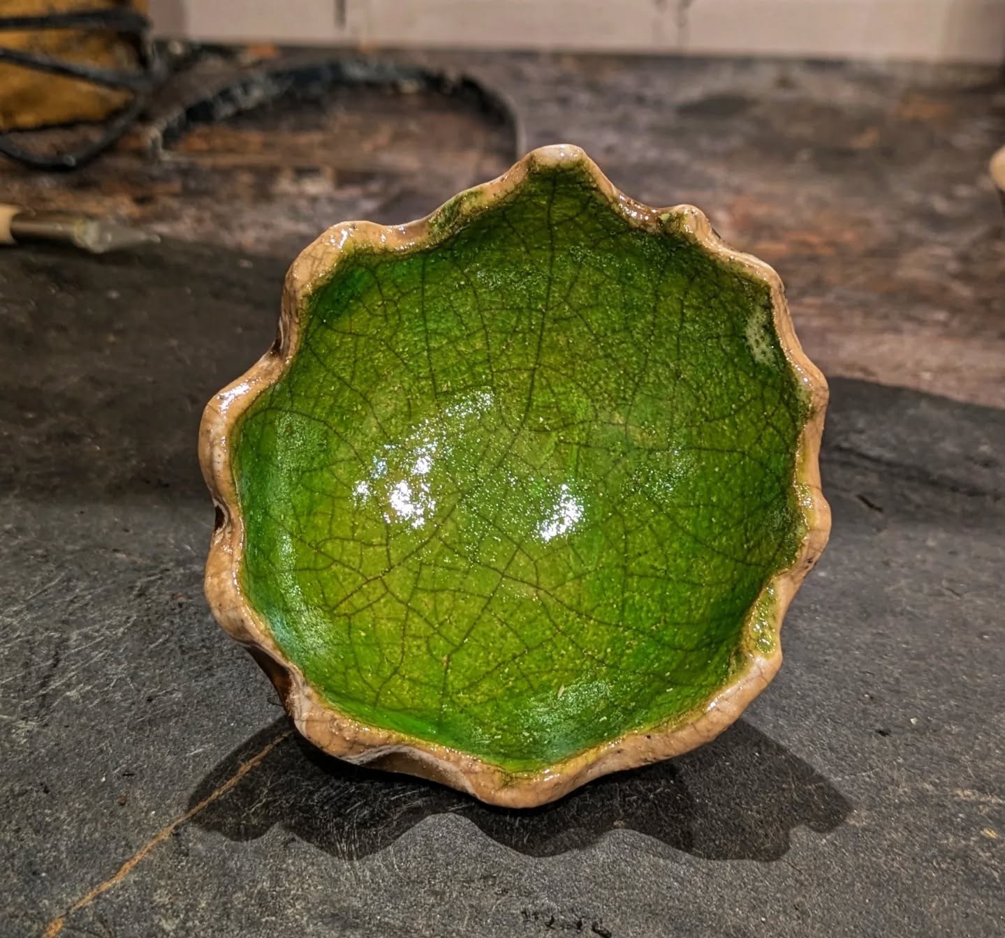 Finished green crackle raku vessel